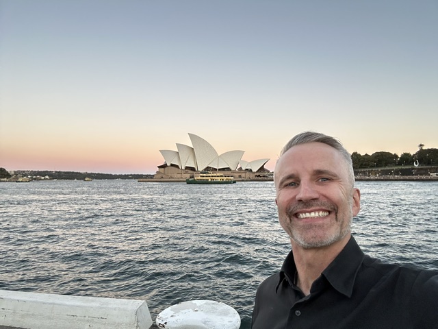 Stephen at Sydney Harbour with the Opera House behind